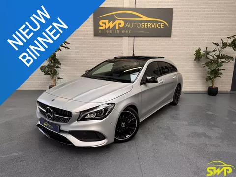 Mercedes-Benz CLA-klasse Shooting Brake 180 | AMG | MAGNO-ZILVER | Pano | Navi | Dodehoek | Memory | Elektr Stoel | Multispaak | Elektr klep