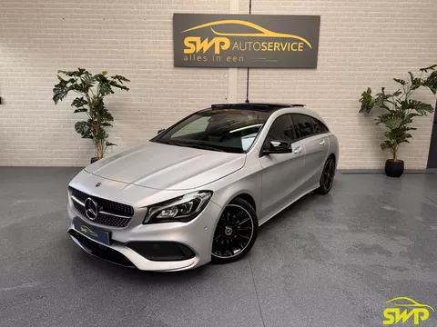Mercedes-Benz CLA-klasse Shooting Brake 180 | AMG | MAGNO-ZILVER | Pano | Navi | Dodehoek | Memory | Elektr Stoel | Multispaak | Elektr klep